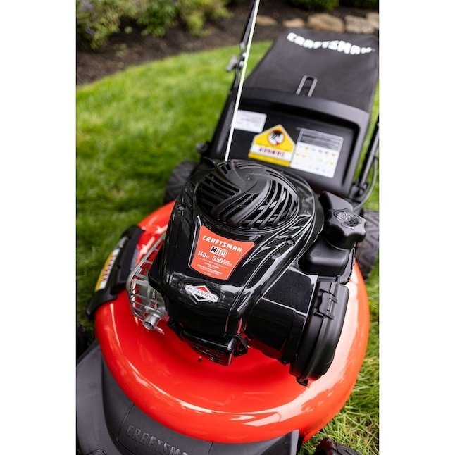 Pillowle Craftsman M110 gas push lawn mower with 21-inch deck and 140cc engine, shown on a lawn.