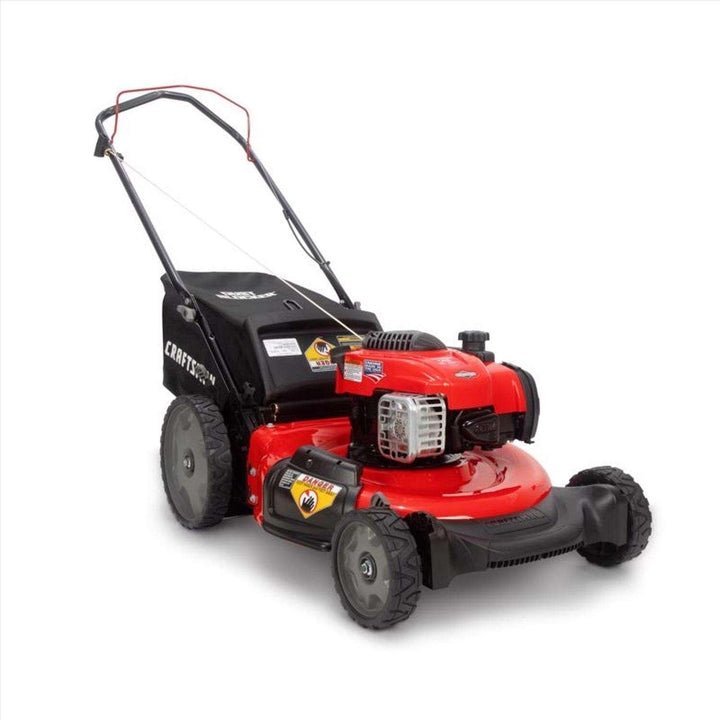 Pillowle CRAFTSMAN gas lawn mower with a 21-inch cutting deck and 150cc engine, shown outdoors on a grassy lawn.