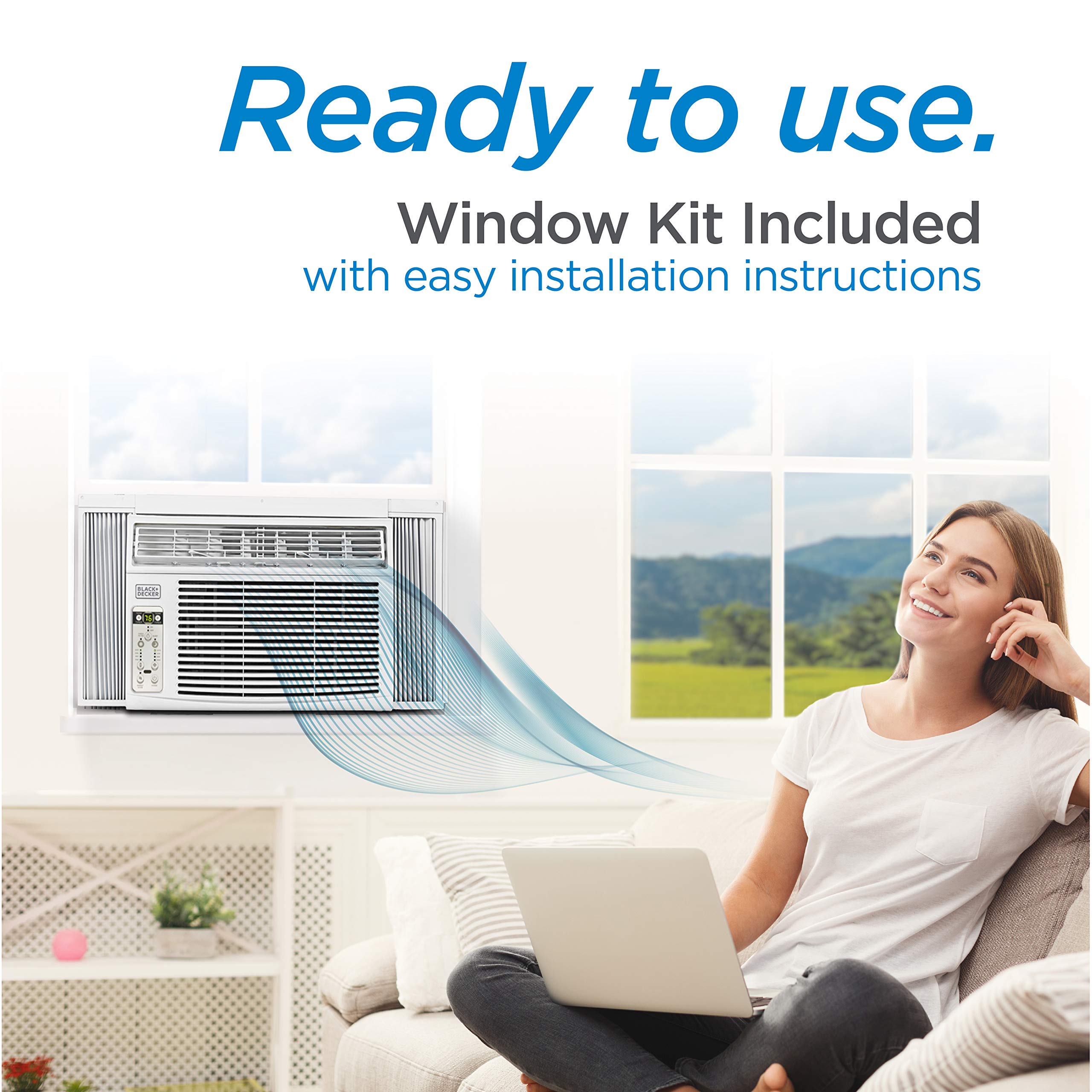 White Pillowle Window Air Conditioner 14300 BTU model BD145WT6 installed in a window, with adjustable vents and control panel visible.