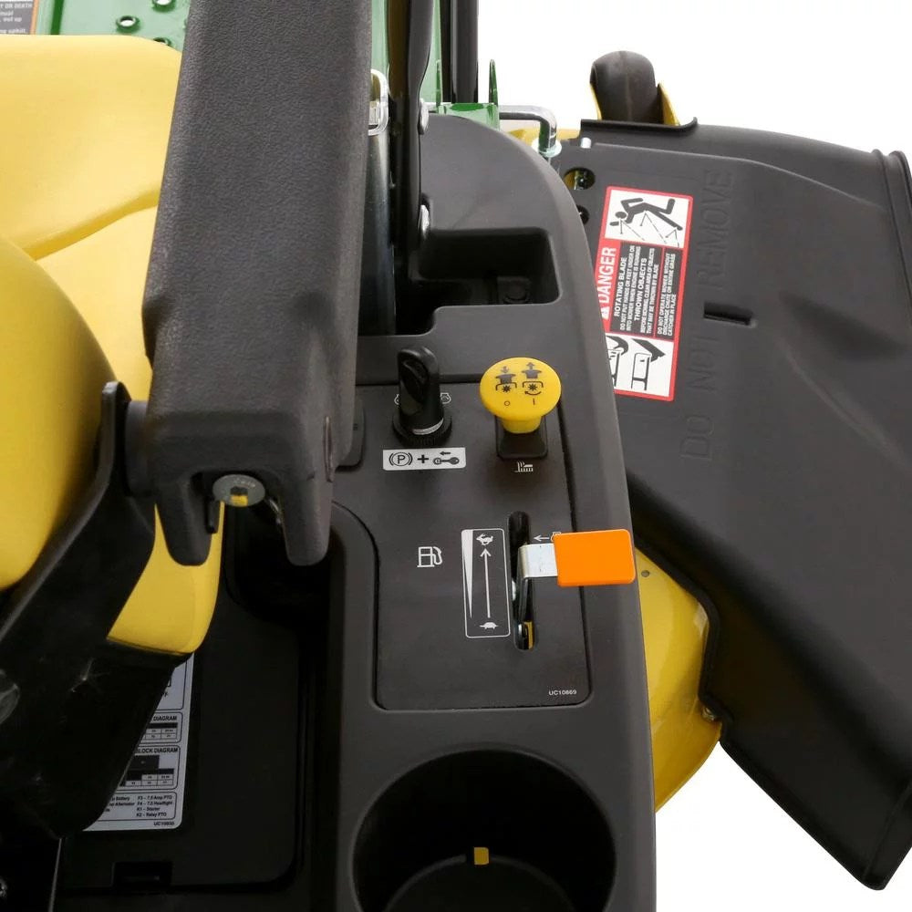 John Deere Z345M zero-turn riding mower with gas engine and dual hydrostatic drive, shown with cutting deck and control handles.