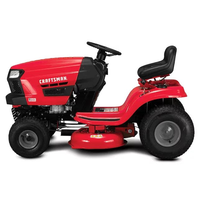 CRAFTSMAN T100 riding lawn mower with 11.5 HP engine, shown outdoors with cutting deck and comfortable seat.