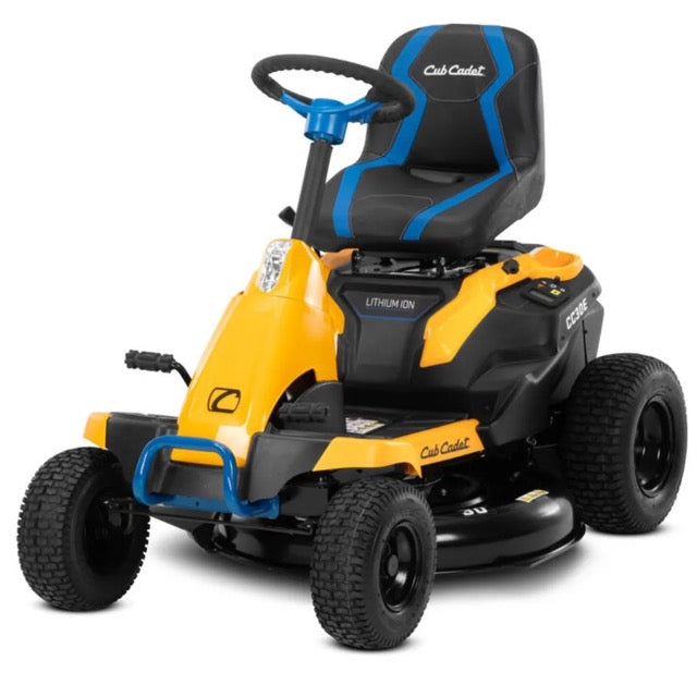 Pillowle Cub Cadet CC30E electric riding lawn mower with a cutting deck and ergonomic seat in a lush green yard.