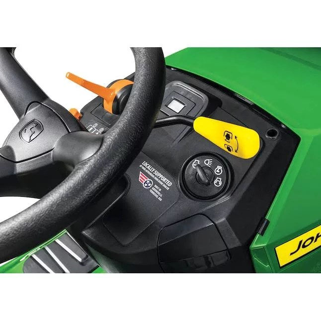 John Deere S100 riding lawn mower with 17.5 HP gas engine and hydrostatic drive, shown outdoors with cutting deck visible