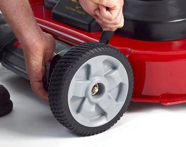 Pillowle Toro TimeMaster lawn mower with 223cc engine and electric start, showing its large cutting deck and grass collection bag.